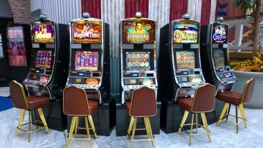 Egypt's Book of Mystery slot game interface on mobile showing reels and stake controls